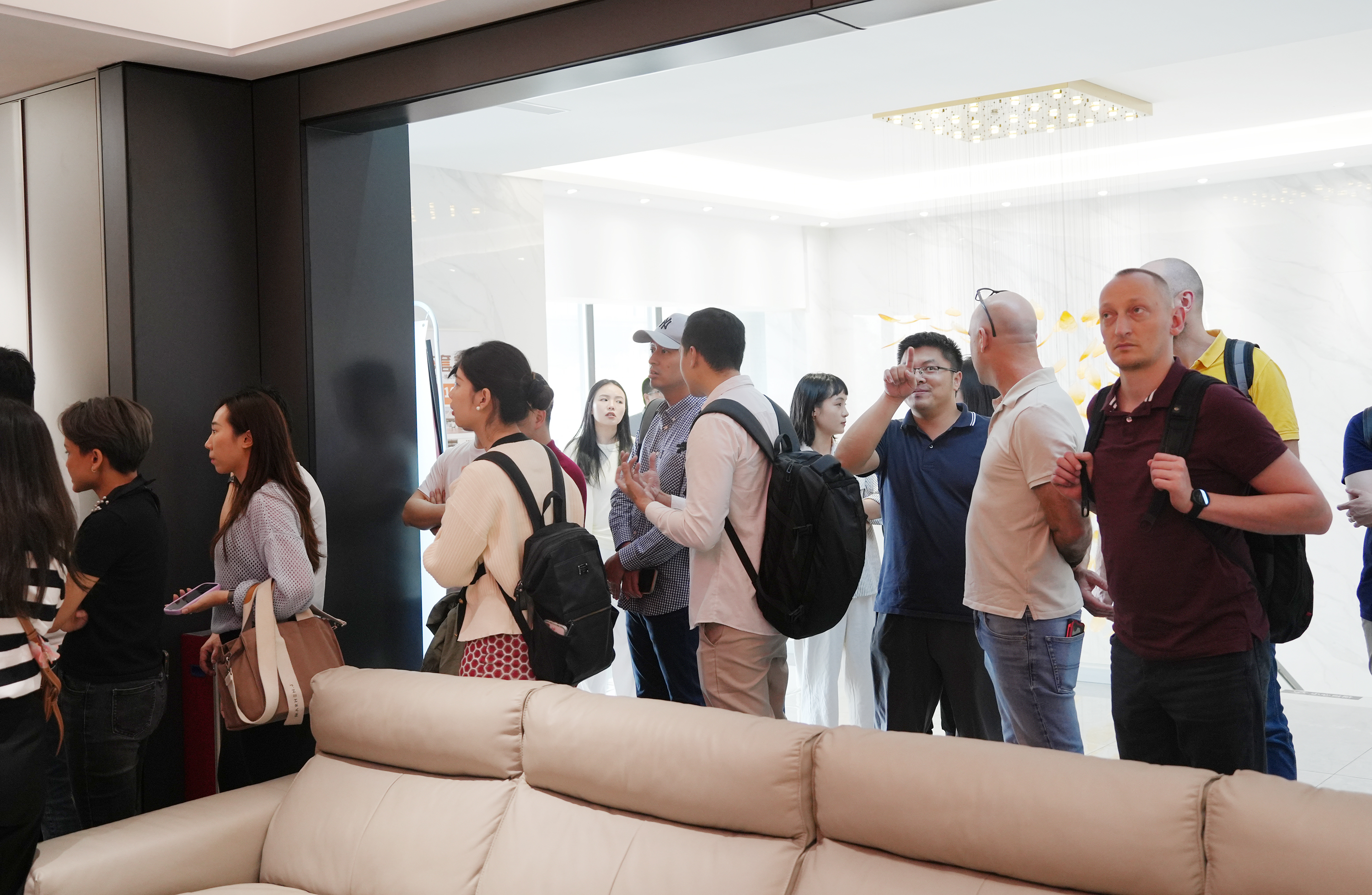 国际交流|COOHOM、酷家乐团队携海外及国内客户到访诗尼曼参观交流
