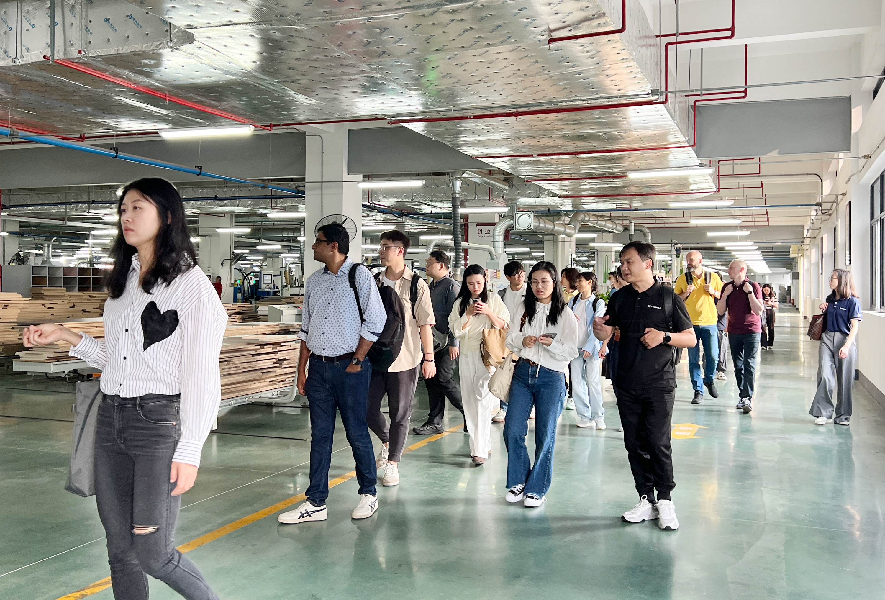 国际交流|COOHOM、酷家乐团队携海外及国内客户到访诗尼曼参观交流